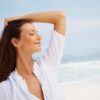 Non-surgical treatment options for lines and wrinkles Beautiful young woman posing near the sea