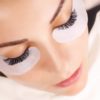 eyelash-extension-procedure-woman-eye-with-long-eyelashes-close-up-picture-id1031432808