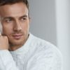 How does Renuvion work to tighten sagging skin? Portrait Of Handsome Young Man With Beautiful Face, Soft Skin